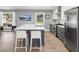 Bright kitchen featuring a large island, stainless steel appliances, and modern cabinetry at 2864 Wofford Rd, Charleston, SC 29414