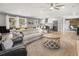 Bright and airy open-concept living room featuring a modern kitchen and comfortable seating at 2864 Wofford Rd, Charleston, SC 29414