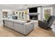 Spacious living area featuring a fireplace, comfortable seating, and access to outdoor patio at 2864 Wofford Rd, Charleston, SC 29414