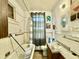 Full bathroom featuring a tub with shower, vanity, and classic fixtures at 3 Hanover St, Charleston, SC 29403