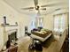 Bright bedroom with a decorative fireplace and ample natural light at 3 Hanover St, Charleston, SC 29403
