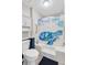 Bathroom with toilet, bathtub and blue turtle-themed shower curtain at 300 Hamlet Rd, Summerville, SC 29485