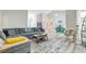 Comfortable living room featuring a gray sofa, area rug, and vaulted ceiling at 300 Hamlet Rd, Summerville, SC 29485
