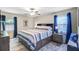 Comfortable main bedroom with a queen size bed and natural lighting at 300 Hamlet Rd, Summerville, SC 29485