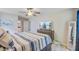 Main bedroom with television, dresser and ensuite bathroom at 300 Hamlet Rd, Summerville, SC 29485