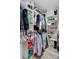 Walk-in closet with shelves and rods to hang clothes at 300 Hamlet Rd, Summerville, SC 29485