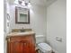 Bathroom with wood vanity, granite countertop, and modern fixtures at 302 Springview Ln # 10, Summerville, SC 29485