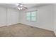 Comfortable bedroom with carpeting and a window that provides natural light at 302 Springview Ln # 10, Summerville, SC 29485