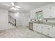 Charming kitchen with stainless steel appliances, white cabinets, and bright natural light at 302 Springview Ln # 10, Summerville, SC 29485