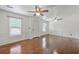 Bright living room featuring hardwood floors, ample natural light, and classic wainscotting at 302 Springview Ln # 10, Summerville, SC 29485
