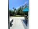 View of the backyard from the screened in porch, highlighting the green space at 315 Grouse Park, Charleston, SC 29414
