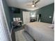 Bedroom with a bed, desk, chair, closet, ceiling fan, TV, lamp, rug, and mirror at 315 Grouse Park, Charleston, SC 29414