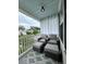 Cozy front porch with comfortable seating, ceiling fan, and view of the neighborhood at 315 Grouse Park, Charleston, SC 29414