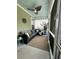 Cozy screened porch with comfortable seating, a ceiling fan, and decorative elements at 315 Grouse Park, Charleston, SC 29414