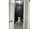 This is a toilet room featuring tiled floors, a new toilet and silver towel rack at 315 Grouse Park, Charleston, SC 29414