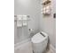 Modern toilet and fixtures in a clean, well lit bathroom at 32 Briarcliff Dr, Charleston, SC 29407