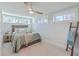 Cozy bedroom with natural light, ceiling fan, and stylish decor offers a relaxing retreat at 32 Briarcliff Dr, Charleston, SC 29407