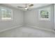 Inviting bedroom with plush carpet, ceiling fan, and natural light at 32 Briarcliff Dr, Charleston, SC 29407