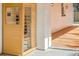Outdoor sauna unit with glass door on a concrete patio, next to the home's exterior at 32 Briarcliff Dr, Charleston, SC 29407