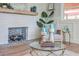 A charming fireplace with decorative tiles, candles, and a stylish mantle at 32 Briarcliff Dr, Charleston, SC 29407