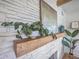 A stylish fireplace with a wooden mantel and decorative accents at 32 Briarcliff Dr, Charleston, SC 29407