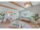 Bright and airy living room with exposed ceiling beams and stylish decor at 32 Briarcliff Dr, Charleston, SC 29407