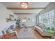 Cozy living room with natural light, stylish decor, and hardwood floors at 32 Briarcliff Dr, Charleston, SC 29407