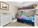 A bedroom featuring a bunk bed, dresser, and window with natural light at 332 Damascus Dr, Summerville, SC 29483