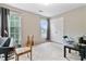 Spacious carpeted bedroom with natural light from windows, neutral walls and a double door closet at 332 Damascus Dr, Summerville, SC 29483