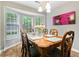Sunlit dining room featuring a traditional table set and bay window at 332 Damascus Dr, Summerville, SC 29483