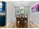 Dining room with a charming bay window and elegant dining set at 332 Damascus Dr, Summerville, SC 29483