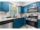 Stylish kitchen with stainless steel appliances and lots of natural light at 332 Damascus Dr, Summerville, SC 29483