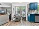 Bright breakfast nook with chair and view of the kitchen's updated stainless appliances at 332 Damascus Dr, Summerville, SC 29483