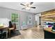 Bright living area with wood-look floors and plenty of natural light from the two windows at 332 Damascus Dr, Summerville, SC 29483