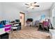Spacious living area featuring wood-look floors, neutral walls, and ample natural light from the windows at 332 Damascus Dr, Summerville, SC 29483