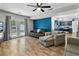 Open living room with backyard access and kitchen view with stainless steel appliances at 332 Damascus Dr, Summerville, SC 29483