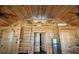 Spacious living area with vaulted wood ceilings, loft access, and modern appliances at 3360 Baldwin Ln, Green Pond, SC 29446