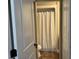 This bathroom offers a shower-tub combination behind a full white curtain at 339 Sea Cloud Cir, Edisto Island, SC 29438