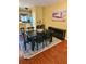 Inviting dining room with a charming decor, perfect for entertaining guests and Gathering dinners at 339 Sea Cloud Cir, Edisto Island, SC 29438