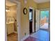 Hallway leading to the bathroom and outdoor deck at 339 Sea Cloud Cir, Edisto Island, SC 29438