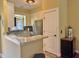 Well-equipped kitchen with stainless steel appliances and breakfast bar at 339 Sea Cloud Cir, Edisto Island, SC 29438