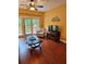 Living room with access to the balcony, decorative chair, and TV at 339 Sea Cloud Cir, Edisto Island, SC 29438