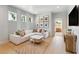 Cozy living room with a comfortable sofa, decorative pillows, and unique zebra-print rug at 357 Claret Cup Way, Charleston, SC 29414