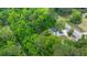 Aerial view of the house surrounded by lots of green trees at 358 Highway 78, Ridgeville, SC 29472