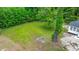 Expansive backyard featuring lush lawn with plenty of tree coverage at 358 Highway 78, Ridgeville, SC 29472