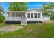 Charming white house with inviting porch and well-manicured lawn at 358 Highway 78, Ridgeville, SC 29472