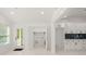 Well-lit laundry room area with washer/dryer hookups and cabinets for plenty of storage at 358 Highway 78, Ridgeville, SC 29472