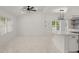 Open-concept living area featuring marble floors and easy flow to kitchen at 358 Highway 78, Ridgeville, SC 29472