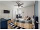 Bedroom with a patterned bed, desk, ceiling fan, and a decorative dog bed at 3656 Spindrift Dr, Mount Pleasant, SC 29466