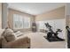 Bonus room with a stationary bike, shelving, a sofa, and shuttered windows at 3656 Spindrift Dr, Mount Pleasant, SC 29466